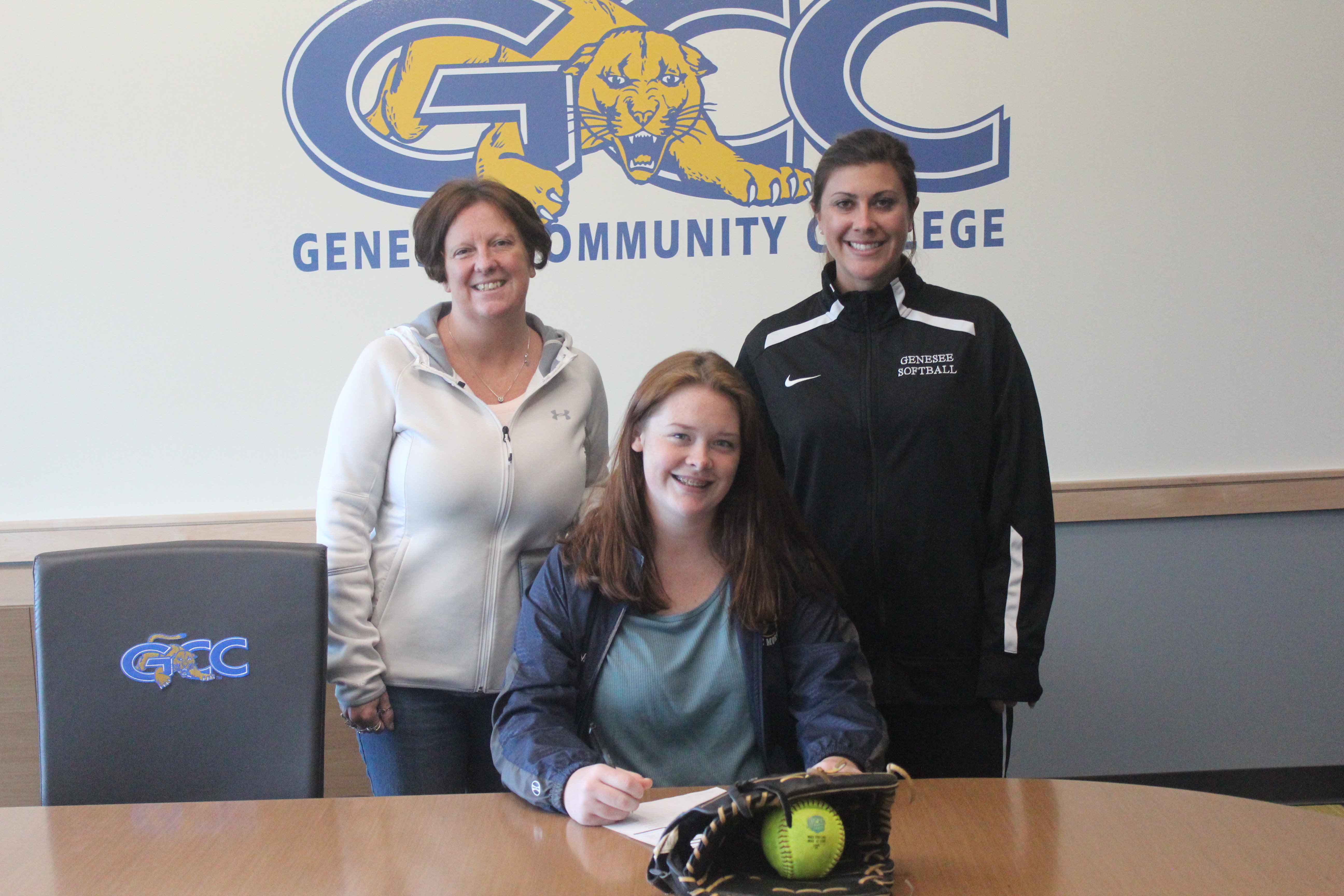 Photo of Emily Szwaczkowski signing