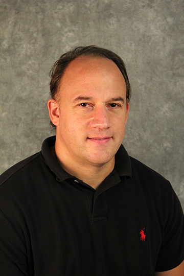 Headshot of Charles Scruggs