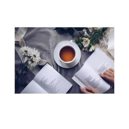 graphic for poetry featuring a cup of tea and a book